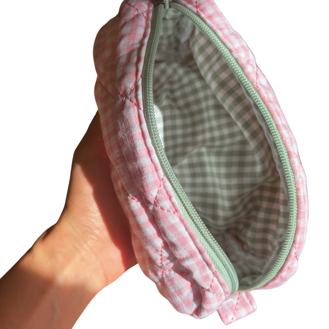 pink gingham makeup bag with green zipper and matcha gingham
