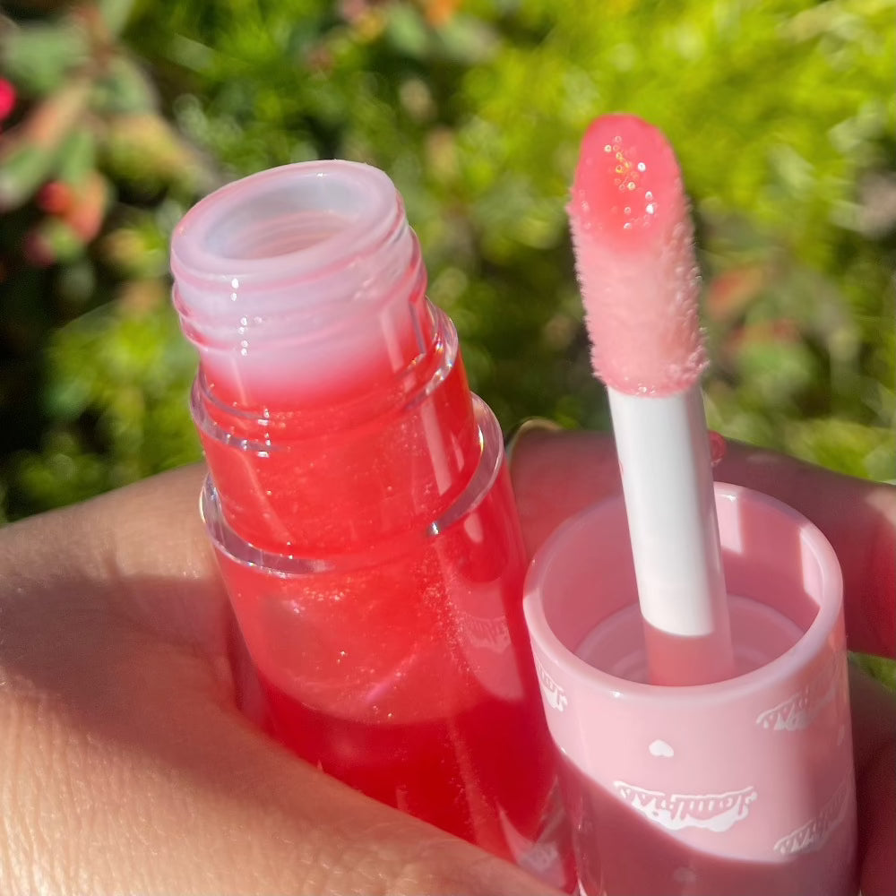 coral pink lip gloss by cloudicos