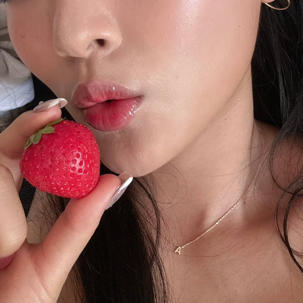 red lip gloss strawberry aesthetic