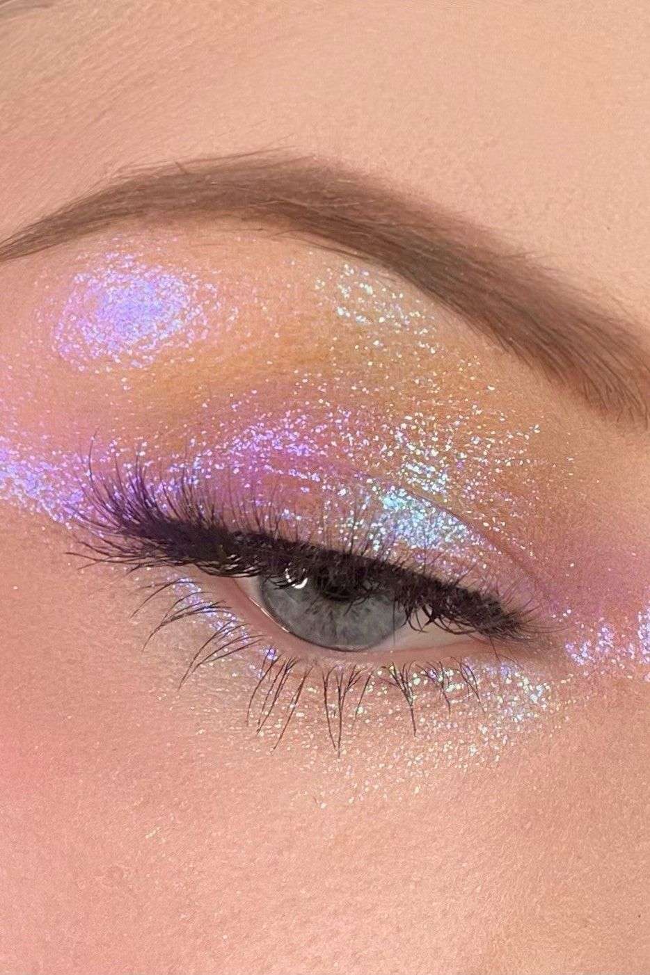 sparkly iridescent multichrome glitter pigment swatched on eyes