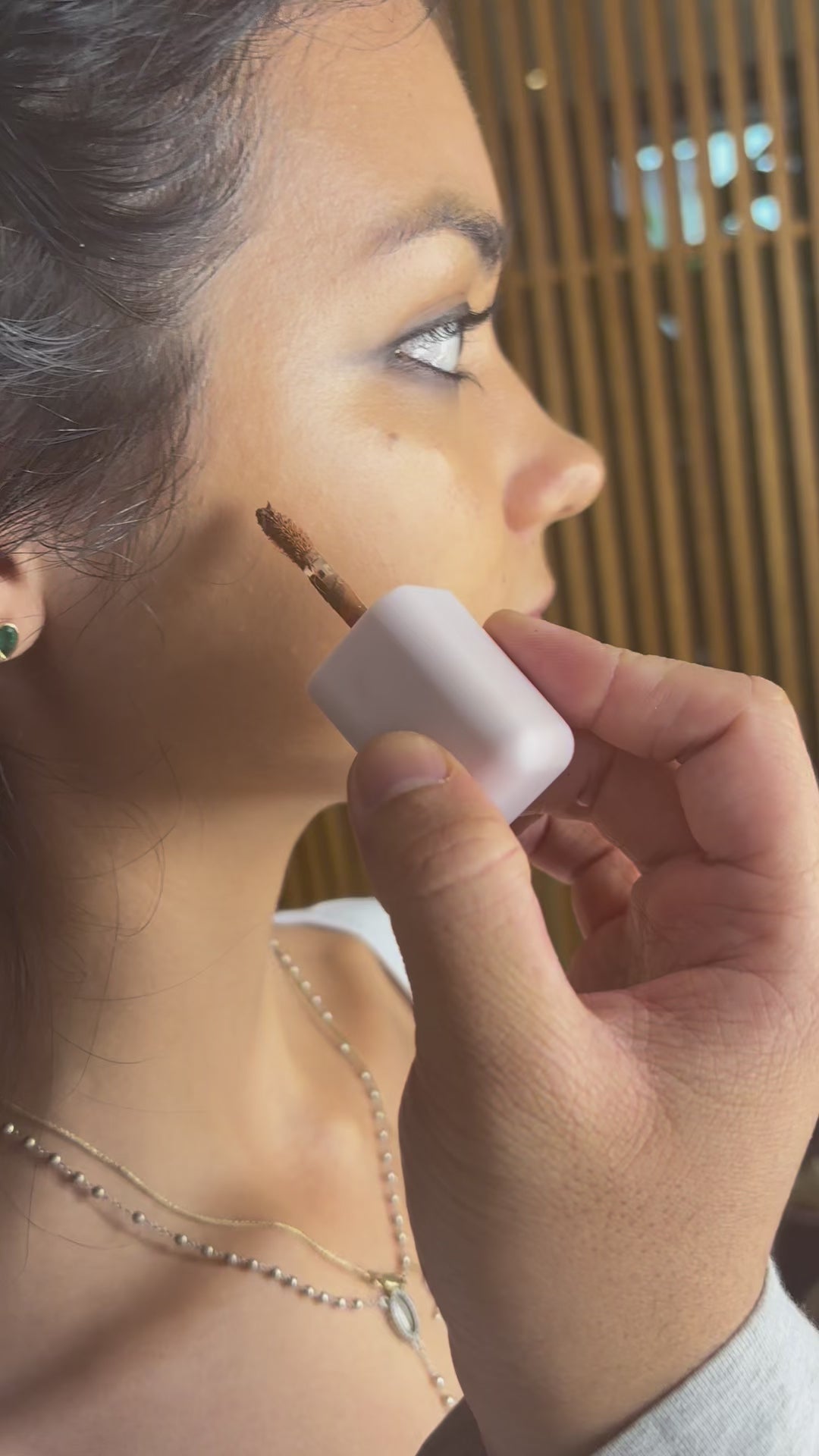 applying liquid bronzer