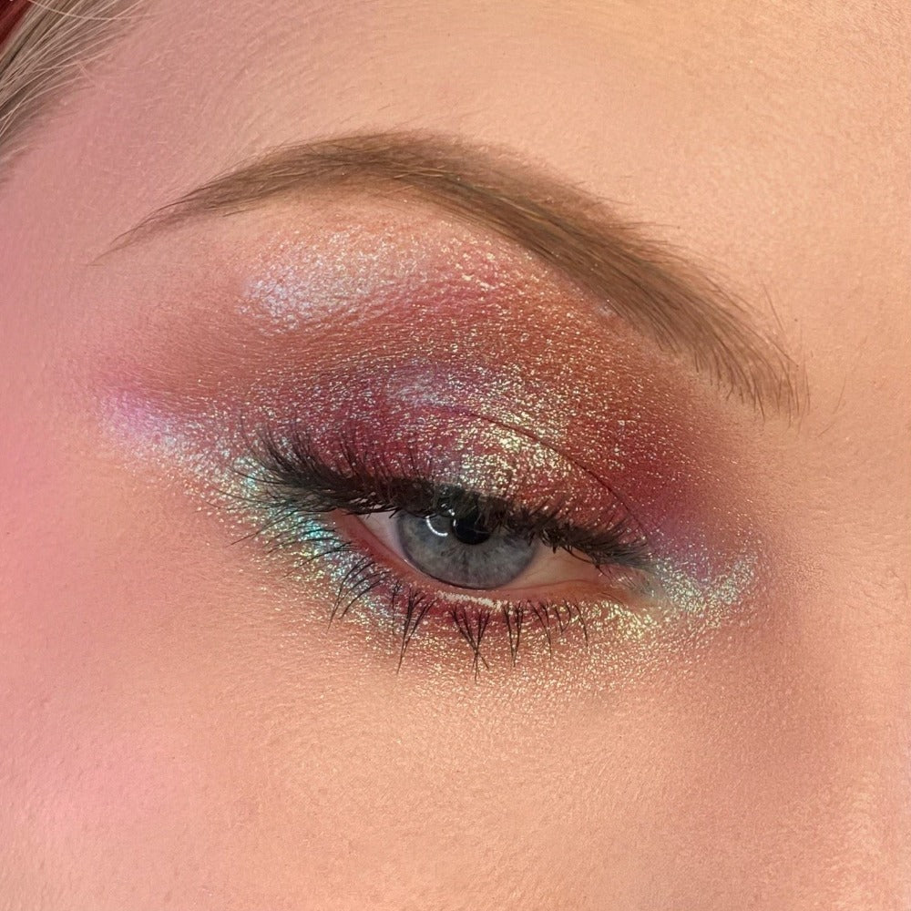 purple sangria pigmented eyeshadow on eyes swatched duochrome